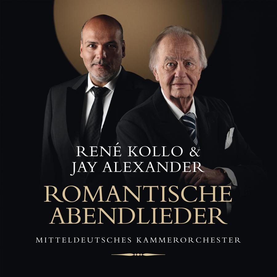 Release-Cover „Romantische Abendlieder“ von Opernsänger René Kollo und Jay Alexander mit Mitteldeutsches Kammerorchester. Dunkles Doppelporträt zweier Sänger im Anzug vor schwarzem Hintergrund mit goldenem Kreis; frontale Studioaufnahme, warme Akzente und klassische Eleganz.